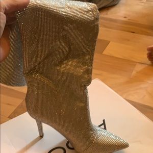 Slouchy knee high heeled boots